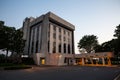 Large Bank and Office Building with Drive Through and sunset Daylight background