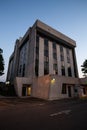 Large Bank and Office Building with Drive Through and sunset Daylight background