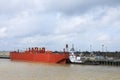 Large barge docked on Mississippi River in New Orleans, Louisiana, United States