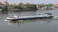 Large barge transports oil on the Chao Phraya river