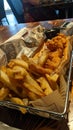 A large basket of fish and chips