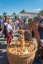 A large basket with onions at the regional festival-fair Luk-luchok August 25, 2018 in the city of Luh, Ivanovo region, Russia. Royalty Free Stock Photo