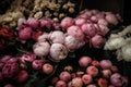 large baskets with peonies of different colors on the counter of a flower shop