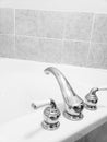 Large bath tub faucet black and white Royalty Free Stock Photo