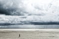 large beach with sormy clouds Royalty Free Stock Photo