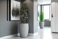 large beaful plants in original gray white and spotted pots fit perfectly into interior of bright empty office