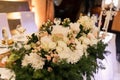 A large beautiful bouquet of flowers on the table of the newlyweds at the wedding Royalty Free Stock Photo