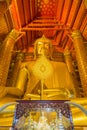 The large beautiful golden buddha statue in church of Wat Phananchoeng. Royalty Free Stock Photo