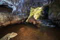 a large beautiful grotto from which the atysh waterfall flows. Bashkortostan.