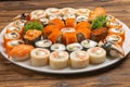 A large beautiful sushi set with maki rolls, nigiri and gunkans Royalty Free Stock Photo