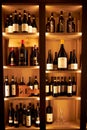 Large wooden shelf with wine in the restaurant. Milan Italy. 08.2020