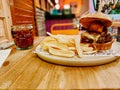 Large beef and cheese burger with skull