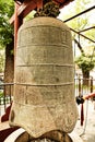 Large bell with carved Chinese characters in the Temple of the Great Bell. Beijing, China.