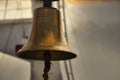 A large bell made of bronze on the ship`s deck Royalty Free Stock Photo