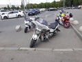 Large biker motorcycles, decorated with drawings that look like tattoos, stand near the entrance to Gorky Park in Moscow