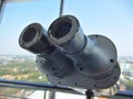 Large binoculars can be used for viewing views on tall buildings Royalty Free Stock Photo