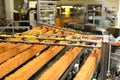 Large biscuit factory. A line of biscuits in a large factory. Packing crackers on the machine. Innovative production