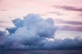 Large bizarre cloud at background of evening sky._