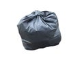 a large, black plastic garbage bag that is filled to capacity and isolated against a plain white background Royalty Free Stock Photo