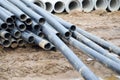 Large black plastic sewer plumbing pipes for the construction of water pipes or sewers at a construction site during the repair. Royalty Free Stock Photo