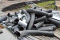 Large black plastic sewer plumbing pipes for the construction of water pipes or sewers at a construction site during the repair Royalty Free Stock Photo