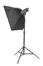 A large black strip softbox on a metal stand, isolated on a white background. Photography studio equipment.