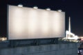 Large blank billboard on a building roof at evening Royalty Free Stock Photo