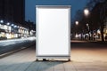 Large blank billboard on a city street at night, mock up, 3D rendering, Vertical blank white billboard at a bus stop on a city Royalty Free Stock Photo