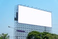 Large blank billboard located on the side of the road with clear sky background Royalty Free Stock Photo