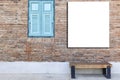 Large blank billboard mounted on a red brick wall Royalty Free Stock Photo