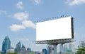 Large blank billboard on road with city view background