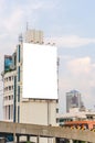 large blank billboard on road with city view background Royalty Free Stock Photo