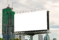 large blank billboard on road with city view background Royalty Free Stock Photo