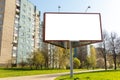 Large blank triangle white billboard in city background