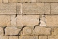 Large blocks beige rectangles cobblestones part powerful protective wall base stone design