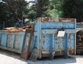 large blue container for the collection of wood and wooden windo