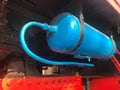 Large blue iron metal cylindrical industrial tank. Gas cylinder for storage of liquefied gas under pressure