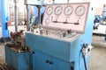 Large blue stand for hydrotesting the valve, pipeline fittings, pressure gauges, leak testing, pressure in the factory.