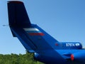 Large blue tail postal Russian cargo aircraft on the background of the sky