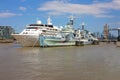Large boat or ship sails through the English waters of the Thames river Royalty Free Stock Photo