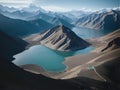 large body of water surrounded by mountains