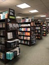 A large bookstore in downtown New York in Manhattan with lots of bookshelves with colorful books on them