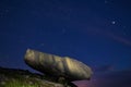 A large boulder on the edge of the abyss.