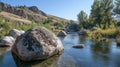 Large Boulders in a Tranquil River Landscape Royalty Free Stock Photo