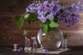 A large bouquet of lilacs on the table. Still life. Royalty Free Stock Photo