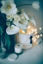 Large bouquet of white spring flowers in a vase, daffodils, tuli Royalty Free Stock Photo