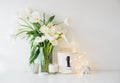 Large bouquet of white spring flowers in a vase, daffodils, tuli Royalty Free Stock Photo