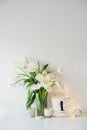 Large bouquet of white spring flowers in a vase, daffodils, tuli Royalty Free Stock Photo