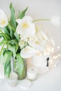 Large bouquet of white spring flowers in a vase, daffodils, tuli Royalty Free Stock Photo