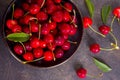 Large bowl of bright red cherries on dark background Royalty Free Stock Photo